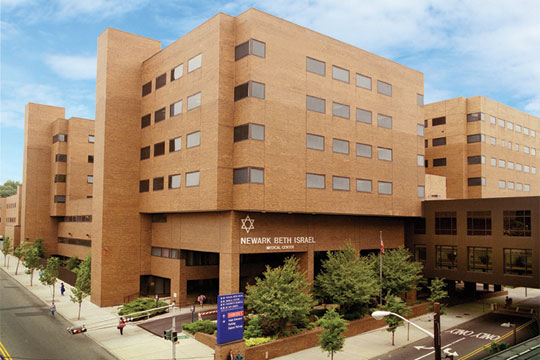 A picture containing sky, building, outdoor, apartment building  Description automatically generated